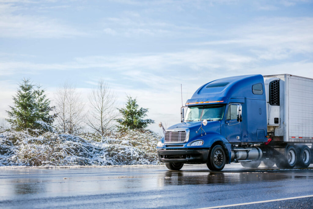 Blue truck in snow